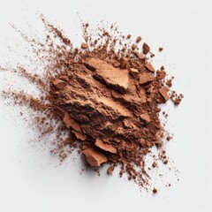 Brown powder, scattered,  on white