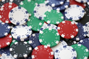 Poker Table With Poker Chips Turns In Casino. Many Poker Chips Spins on the Table