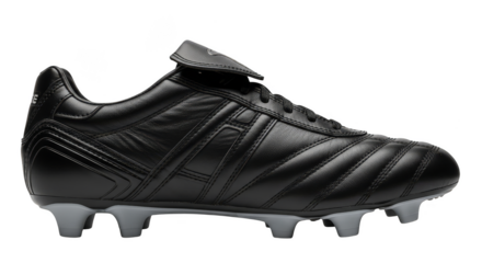 Sleek black soccer shoe on display