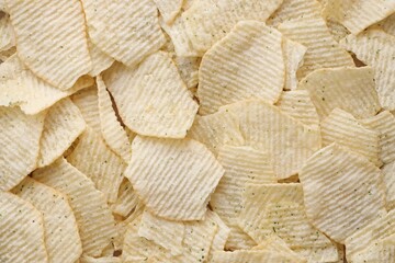 Fototapeta premium Homemade Flavored Paprika Potato Chips in a Bowl, top view. Flat lay