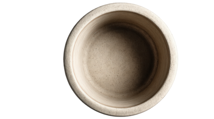 Empty beige ceramic bowl with a rough porous texture and thick rim seen from a top-down perspective.