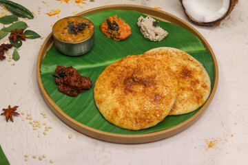Thatte or Tatte Idli also known as Plate Idly is a Popular south Indian Food, served with sambar and chutney.