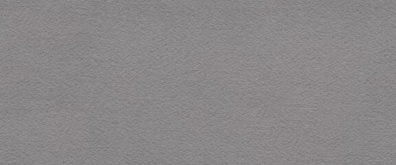 A seamless expanse of cool gray felt suggests a quiet sophistication and an air of refined minimalism