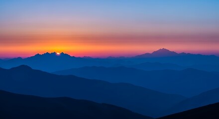 Obraz premium Majestic Mountain Range at Sunset with Vivid Sky Tones and Layered Hills Beautiful Landscape