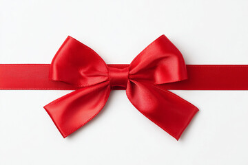 Red satin ribbon bow on white background perfect for gift wrapping decoration or festive holiday design