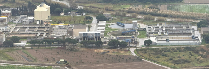Aerial view of intricate water treatment plant labyrinth, evoking World Water Day awareness and...