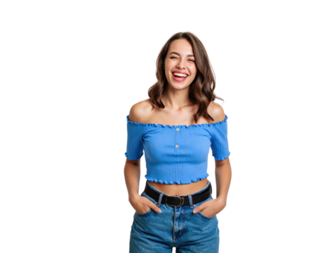 Cheerful brunette woman laughing in a blue offtheshoulder crop top and jeans hands in pockets. - Powered by Adobe