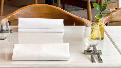 Serene midday still life, elegant napkins poised like sentinels, embodying Hygge tranquility, perfect for World Tableware Day delight