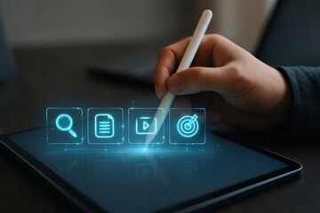 Digital tablet display with glowing application icons.