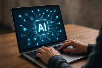 Person working on a laptop with an AI graphic displayed.