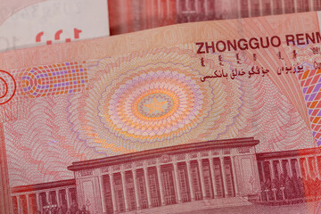 protection of Chinese money in ultraviolet light, reverse of the hundred yuan banknote in ultraviolet light , details of Chinese money, money in ultraviolet light
