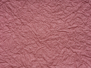 A symphony of roseate folds, the paper's texture whispers tales of grace and aged elegance