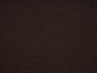 A rugged landscape of texture, the dark paper evokes the essence of earth's raw beauty