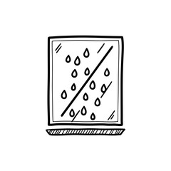 Raindrop on glass symbolizing emotional barrier and distance