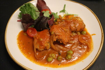 Maltese cuisine: pulpetti tal-fenek (Maltese rabbit patties) in Valletta, Malta
