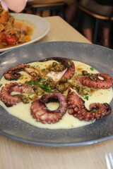 Maltese cuisine: grilled octopus with mashed potatoes in Valletta, Malta