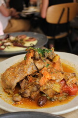 Maltese cuisine: stuffat tal-fenek (traditional Maltese stewed rabbit) in Valletta, Malta