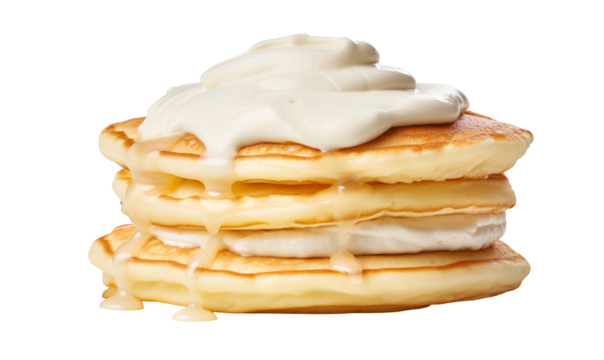 thick white yogurt appears to be naturally spooned onto pancakes, It has a soft, fluffy texture, asymmetrical