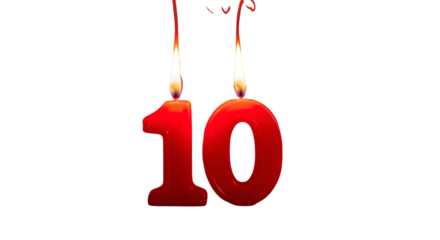 Red number ten candles burning with bright flames on a black background for a tenth birthday celebration