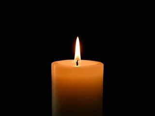 A Gentle Glow. The Warm Light of a Candle Against the Deep Darkness of the Night.