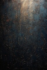 Obraz premium Close-up of textured dark surface with small scattered particles and hints of rusty orange and blue colors creating a rough gritty appearance