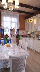 Healthy food at home. Woman is preparing the proper meal in the kitchen.
