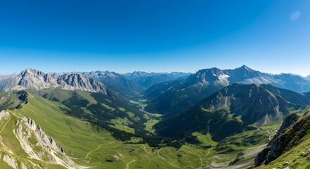 Obraz premium Stunning mountain valley view perfect for adventure travel campaigns or inspirational landscape projects, with vibrant green hillsides and a clear blue sky