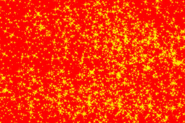 Vibrant abstract background of shimmering red and gold glitter particles creating a festive and sparkling texture