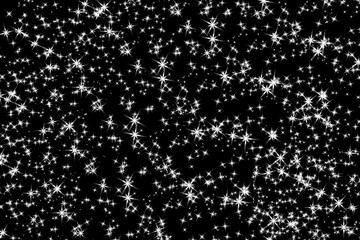 Abstract shimmering silver sparkles and stars on a deep black background creating a magical and festive atmosphere
