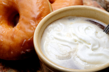Fresh Coffee Latte Served with Glazed Doughnuts – Sweet Breakfast Pastry and Hot Beverage in High Resolution