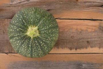 pumpkin on wooden table