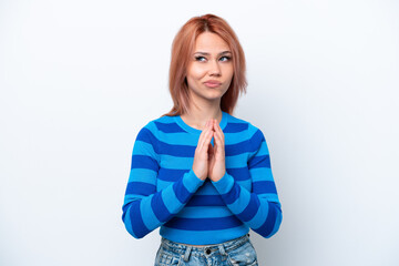 Fototapeta premium Young Russian girl isolated on white background scheming something