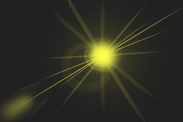 Bright yellow starburst with radiating light rays and lens flare effect on a dark background