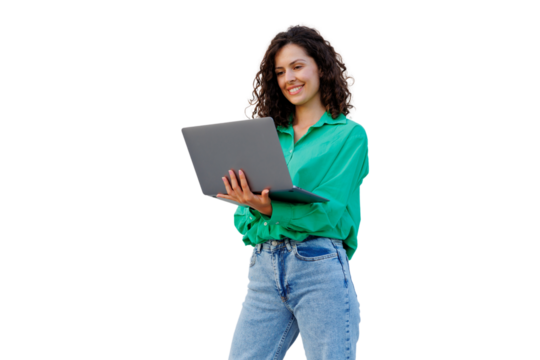 Curly-haired woman wearing green shirt, beaming while gripping laptop against transparent backdrop - Powered by Adobe