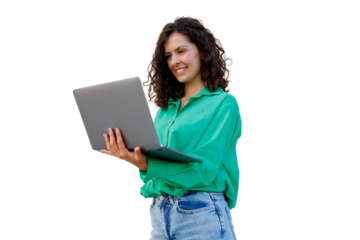 Young woman with curly hair and green shirt smiling and holding a laptop, isolated on transparent background