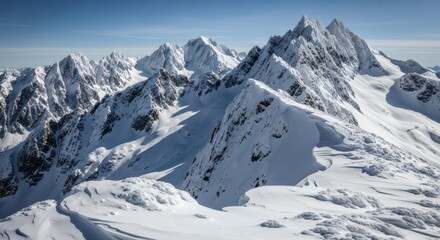 Snow-Capped Mountains Under Clear Blue Sky