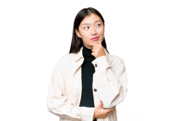 Young Asian woman over isolated chroma key background thinking an idea while looking up