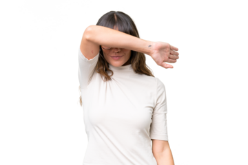 Young caucasian woman over isolated background covering eyes by hands