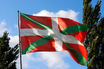 Basque flag waving in the air in a sunny day