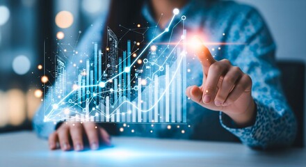 Analyzing Financial Growth: A modern business professional, her finger tracing an upward-trending chart.