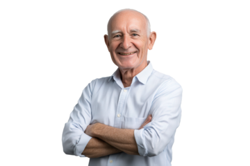 Happy elderly man standing confidently with arms crossed, wearing a light-colored shirt, showcasing a warm smile and a positive attitude