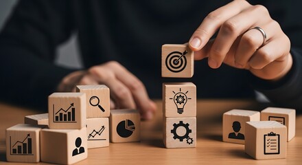 Understanding business strategy concepts: wooden blocks depicting goals, growth, and planning process