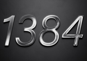 Chrome metal 3D number design of 1384 on grey background.