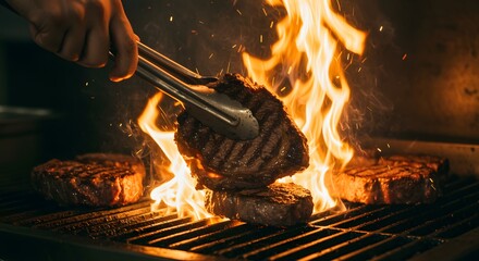 Juicy steak on flaming grill with tongs