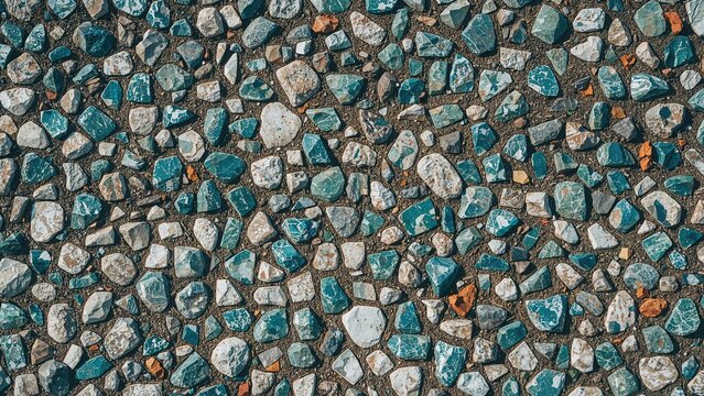 Abstract close-range image showcasing varied colorful cobblestones and mosaic designs