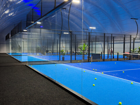 Padel court with lines and net indoor - Powered by Adobe