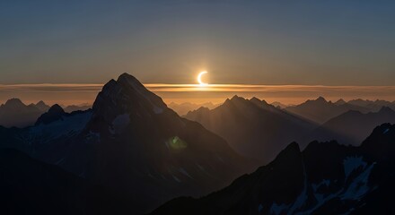 Breathtaking Mountain Range During Sunset with Partial Solar Eclipse