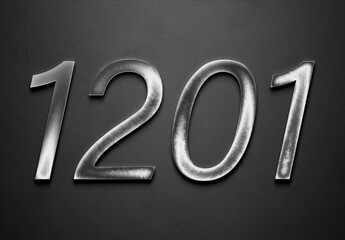 Chrome metal 3D number design of 1201 on grey background.