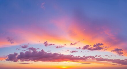 Fototapeta premium Colorful Sunset Sky with Pink Orange Blue Clouds Over Horizon