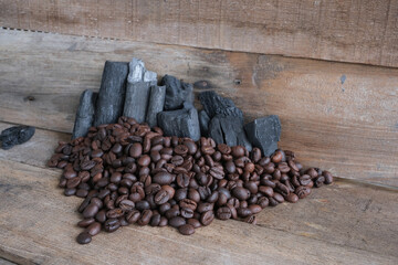 Coffee beans on a wooden background